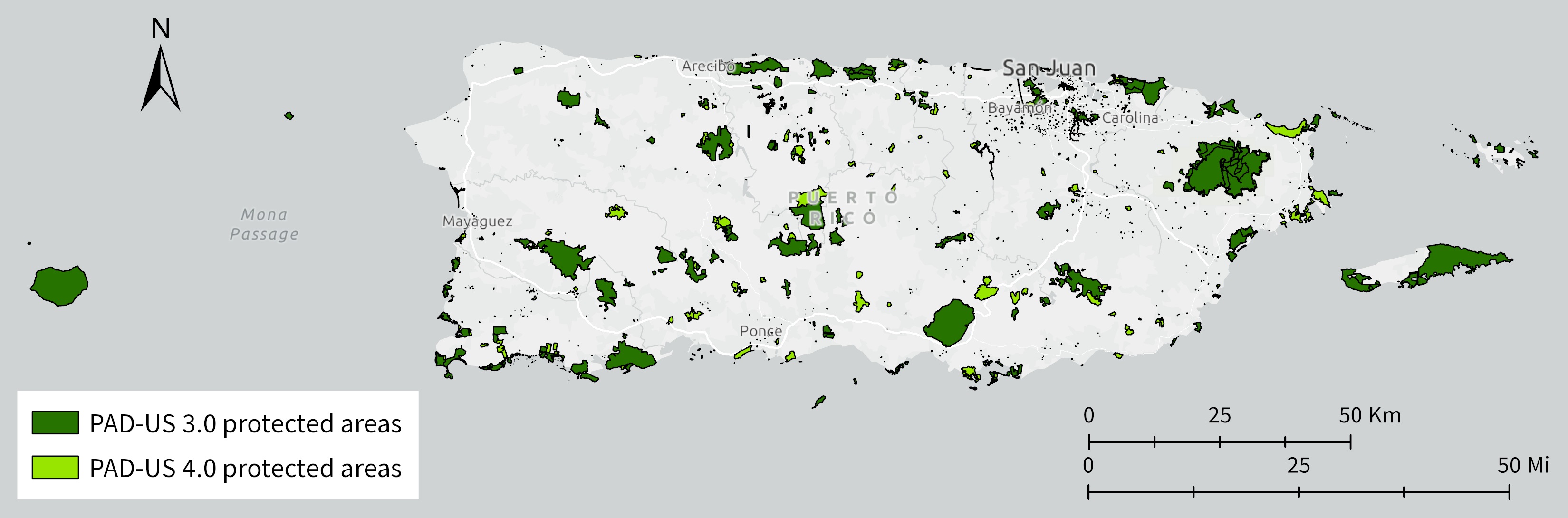 Map of Puerto Rico on gray basemap showing a previous version of protected areas in dark green and a large number of newly added protected areas in bright green.